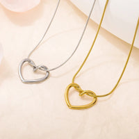 Stainless Steel Hollow Distorted Heart Earrings/Necklace Set