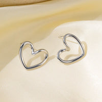 Stainless Steel Hollow Distorted Heart Earrings/Necklace Set