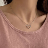 Stainless Steel Hollow Distorted Heart Earrings/Necklace Set