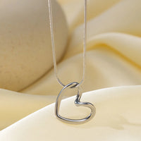 Stainless Steel Hollow Distorted Heart Earrings/Necklace Set