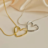 Stainless Steel Hollow Distorted Heart Earrings/Necklace Set